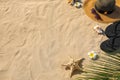 Set with stylish beach accessories on sand Royalty Free Stock Photo