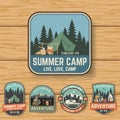 Set of Summer camp badges on the wood board. Vector. Royalty Free Stock Photo