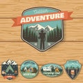 Set of Summer camp badges on the wood board. Vector. Royalty Free Stock Photo