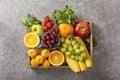 Set of summer fruits and berries in wooden serving.top view Royalty Free Stock Photo