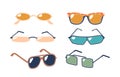 Set Of Sunglasses, Featuring Sleek Frames And Polarized Black, Yellow, Blue And Green Lenses For Optimal Sun Protection