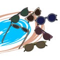 A set of sunglasses, glasses of various shapes, in pastel colors, on a sea background