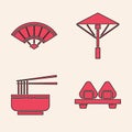 Set Sushi on cutting board, Paper chinese or japanese folding fan, Japanese umbrella from the sun and Asian noodles in Royalty Free Stock Photo