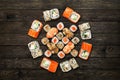 Set of sushi maki and rolls at black rustic wood. Royalty Free Stock Photo