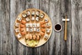 Set of sushi maki and rolls at wood background Royalty Free Stock Photo