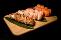 Set of sushi rolls: philadelphia with salmon, tuna and fried roll in batter Royalty Free Stock Photo
