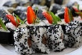 Set of sushi rolls-traditional japanese dish.Top view of assorted sushi,decorated with slices of strawberry.Food background Royalty Free Stock Photo