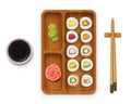 Set sushi rolls with various ingredient on wooden tray. Fast-food collection Royalty Free Stock Photo