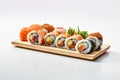 Set of sushi rolls on wooden tray. White background. Japanese cuisine. Generative AI Royalty Free Stock Photo