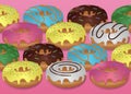 Set of sweet colourful donuts on pink background