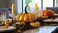 A set table, and on it pumpkins candles. Pumpkin as a dish of thanksgiving for the harvest Royalty Free Stock Photo