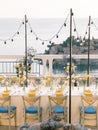 Set table on the terrace of a restaurant overlooking the island of Sveti Stefan Royalty Free Stock Photo