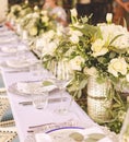 Set table for a white and aqua blue wedding dinner decorated Royalty Free Stock Photo