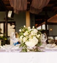 Set table for a white and aqua blue wedding dinner decorated Royalty Free Stock Photo