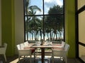 Table in front of a window with beach view