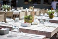 Set tables in an outdoor restaurant Royalty Free Stock Photo