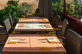 Set tables at outside dining area Royalty Free Stock Photo