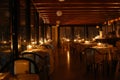 Set tables of a restaurant by candlelight Royalty Free Stock Photo