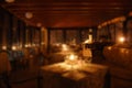 Set tables of a restaurant by candlelight Royalty Free Stock Photo