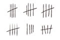 Set tally marks lines or sticks hand drawn isolated on white background. Counting waiting number on wall prison. Grunge Royalty Free Stock Photo