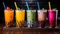 Set of tasty bubble tea in plastic cups on dark background Royalty Free Stock Photo