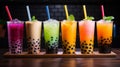 Set of tasty bubble tea in plastic cups on dark background Royalty Free Stock Photo