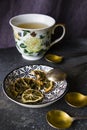 Set of tea, vintage silver spoons, various of tea and cup of tea