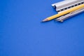 Set of technical drawing tools on a blue background with a copy space Royalty Free Stock Photo