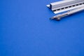 Set of technical drawing tools on a blue background with a copy space Royalty Free Stock Photo