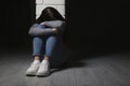 Set teenage girl sitting at column indoors. Space Royalty Free Stock Photo