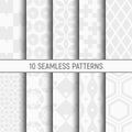 Set of ten seamless patterns. White and grey geometric textures. Royalty Free Stock Photo