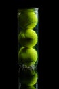 set of tennis balls isolated over  the black background Royalty Free Stock Photo