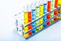 Set of test lab tubes with color liquid on stand Royalty Free Stock Photo