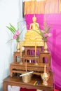 Set of Thai altar table with Buddha statue and holy water dipper Royalty Free Stock Photo