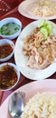 Set of Thai khao mon gai & x28; steamed rice topped with chicken.