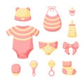 A set of things for a newborn isolated on a white background. Collection for girls in pink color. Cap, bib, panties, clacks,