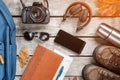 Set of things and tourist equipment for travel and adventure on a gray wooden background. Top view set Royalty Free Stock Photo