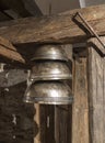 Set of three bells above the other