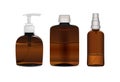 A set of three brown plastic and glass bottles Royalty Free Stock Photo