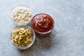 Set of Three Classic Sauce Ketchup, Mayonnaise and Mustard in Small Glass Bowls. Royalty Free Stock Photo