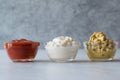 Set of Three Classic Sauce Ketchup, Mayonnaise and Mustard in Small Glass Bowls. Royalty Free Stock Photo