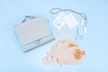 A patient set of colostomy bag on a gentle blue background. Royalty Free Stock Photo