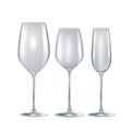 Set of three crystal empty glasses isolated