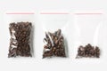 Set of three EMPTY, HALF AND FULL Plastic transparent zipper bag with coffee beans isolated on white. Vacuum package mockup with r