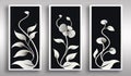 A set of three framed canvases with abstract white plants on black background. Wall art decor Royalty Free Stock Photo