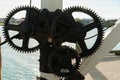 Set of three gear wheels on wharf Royalty Free Stock Photo