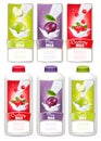 Set of three labels of fruit in milk splashes. Royalty Free Stock Photo