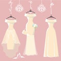 Set of three long bridal dresses hang on ribbons Royalty Free Stock Photo