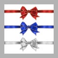 Set of three realistic white, blue and red silk ribbon bow with gold and silver glitter shiny stripes, vector illustration for Royalty Free Stock Photo