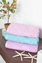 Set of three towels in different colors Royalty Free Stock Photo